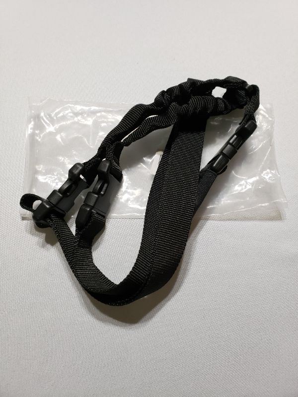 Photo 1 of ADJUSTABLE ROPE STYLE GUN SLING, BLACK. ONE SIZE.