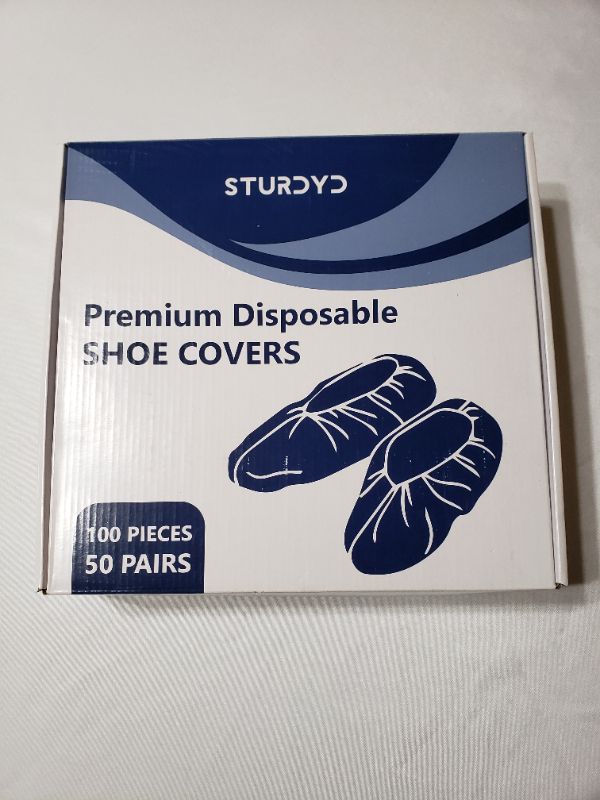 Photo 1 of DISPOSABLE SHOE COVERS. 100 PIECES.