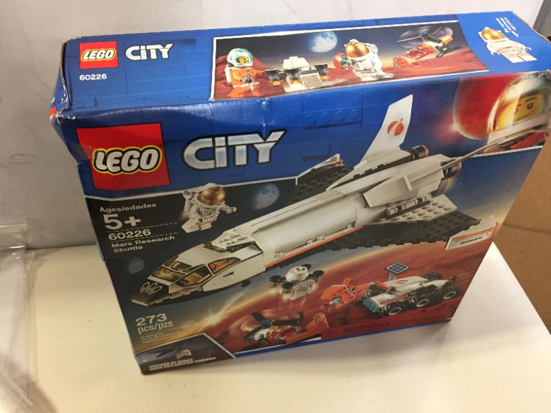 Photo 2 of LEGO City Space Mars Research Shuttle 60226 Space Shuttle Toy Building Kit with Mars Rover and Astronaut Minifigures, Top STEM Toy for Boys and Girls (273 Pieces)
(minor damages to packaging from exposure)