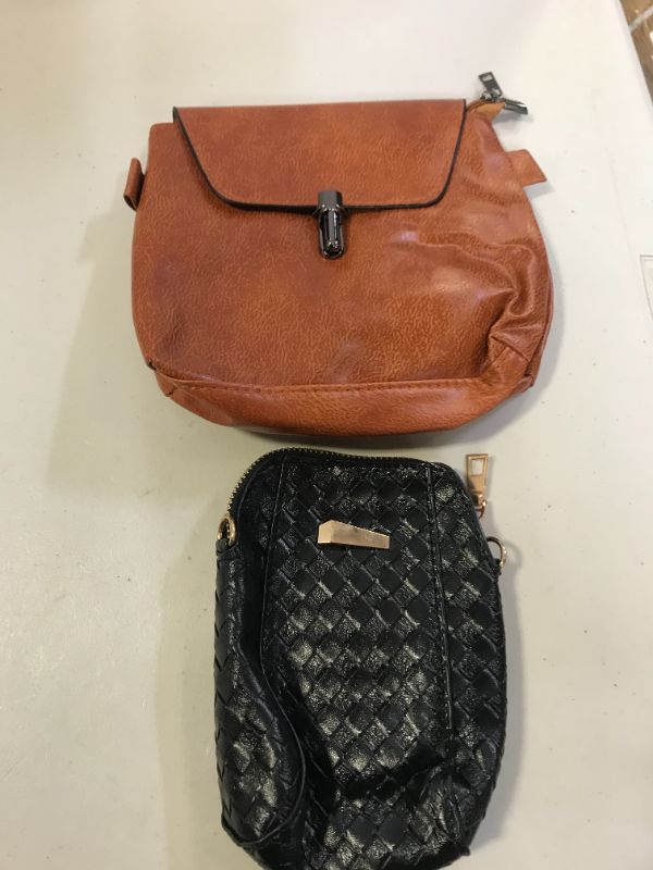 Photo 1 of VARIOUS BAGS BUY AS IS