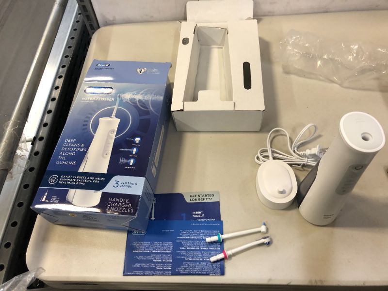 Photo 3 of Oral-B Water Flosser Advanced, Cordless Portable Oral Irrigator Handle with 2 Nozzles