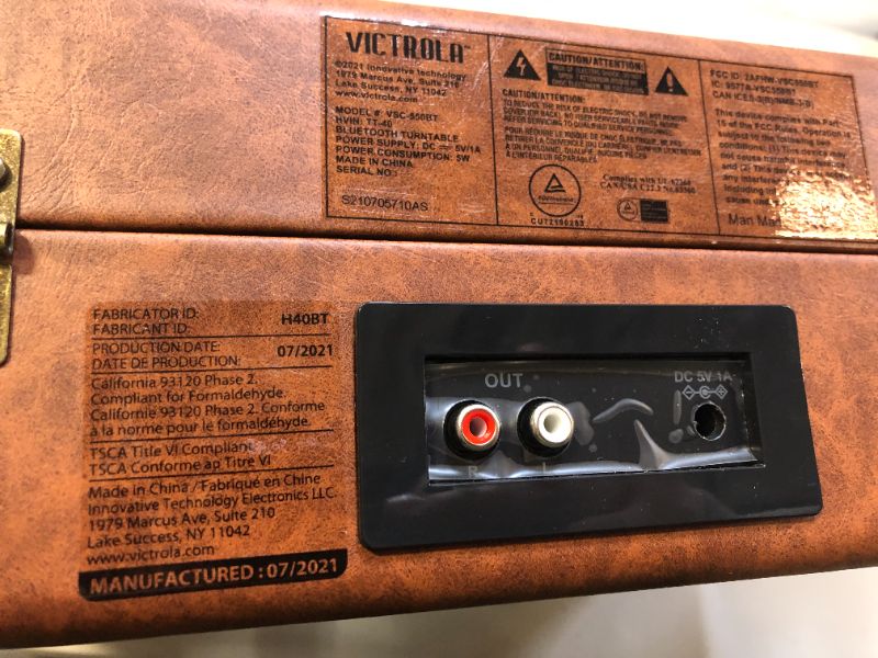 Photo 4 of Victrola Vintage 3-Speed Bluetooth Portable Suitcase Record Player with Built-in Speakers | Upgraded Turntable Audio Sound| Includes Extra Stylus | Brown (STICKER ON ITEM, MISSING BOX AND MANUAL)
