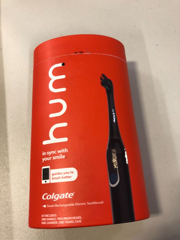 Photo 5 of hum by Colgate Black Electric Toothbrush for Adults, Starter Kit with Travel Case and Extra Refill Head, Rechargeable Smart Sonic Toothbrush, Black (USED BUT LOOKS NEW, MINOR DAMAGES TO BOX)
