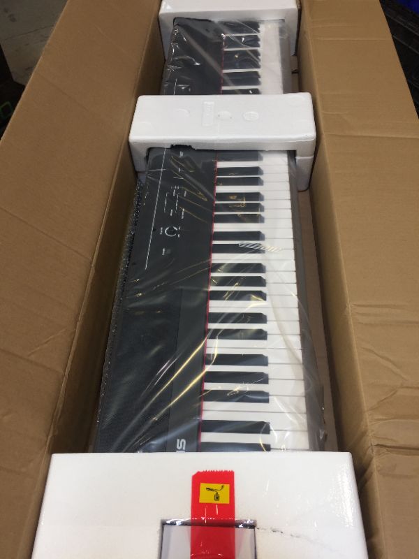 Photo 2 of BOX DAMAGED  BUT ITEM ARE GOOD CONDITION (BRAND NEW OPEN FOR PICTURE,PRODUCT GOOD CONDITION & ALL PARTS COMPLETE)Alesis Recital – 88 Key Digital Piano Keyboard with Semi Weighted Keys, 2x20W Speakers, 5 Voices, Split, Layer and Lesson Mode, FX and Piano L