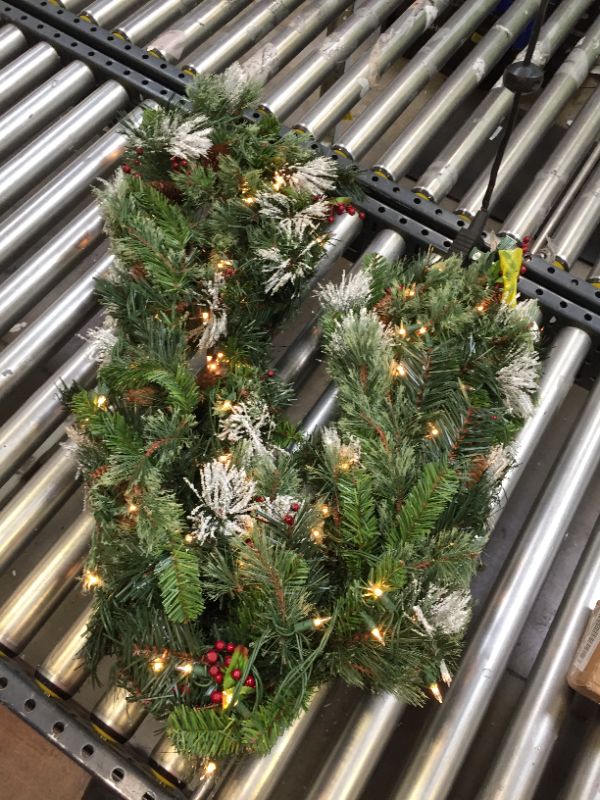 Photo 4 of National Tree Company 9' Wintry Pine Garland With Cones, Red Berries, Snowflakes