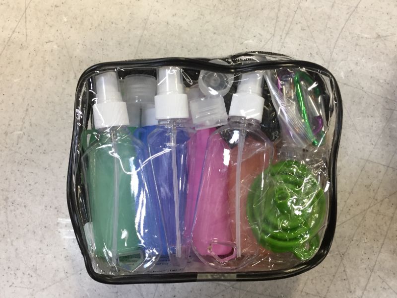 Photo 1 of TSA approved travel kit of bottle containers 