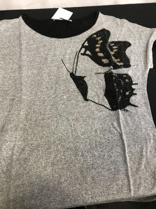 Photo 1 of WOMENS GREY SHIRT SHORT SLEEVE WITH BUTTERFLY DESIGN SIZE LARGE (BUT IS TIGHT FIT AND CAN PASS AS MEDIUM)