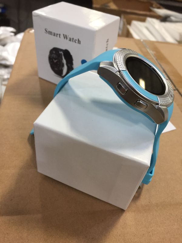 Photo 2 of 1065-V8-BLUE Model Smart Watch includes USB charging cable 