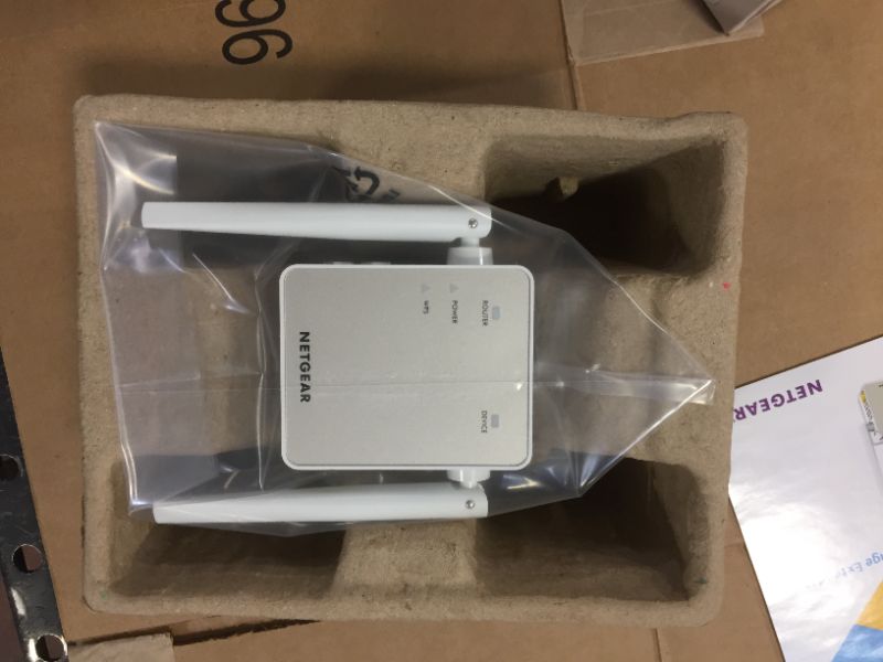 Photo 2 of NETGEAR Wi-Fi Range Extender EX6120 - Coverage Up to 1500 Sq Ft and 25 Devices with AC1200 Dual Band Wireless Signal Booster & Repeater (Up to 1200Mbps Speed), and Compact Wall Plug Design
