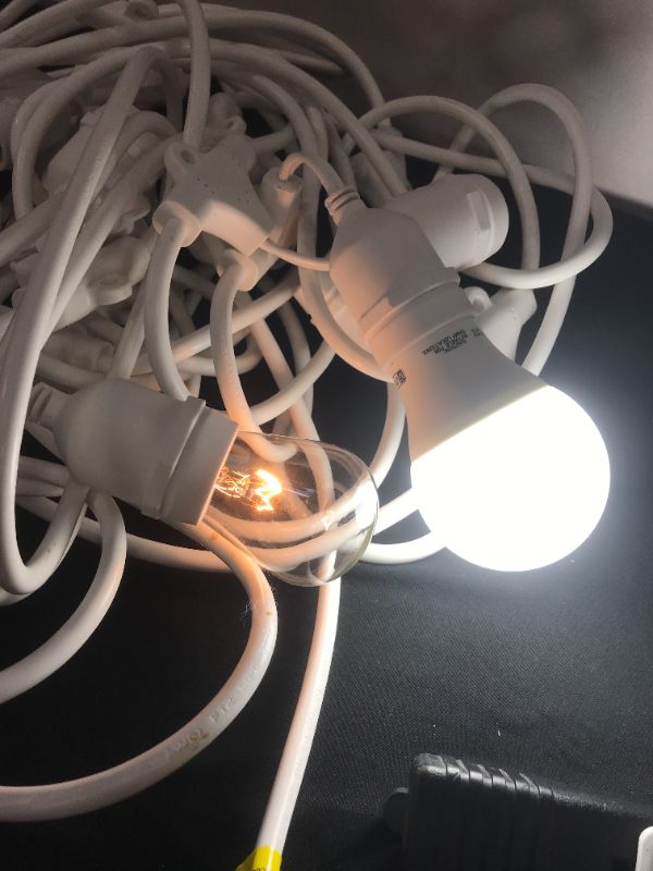 Photo 1 of Amazon Basics Outdoor Patio String Lights  S14 Bulb (Feet Unknown Approx.50 ) ( Bulb not include)model JCD-ST15