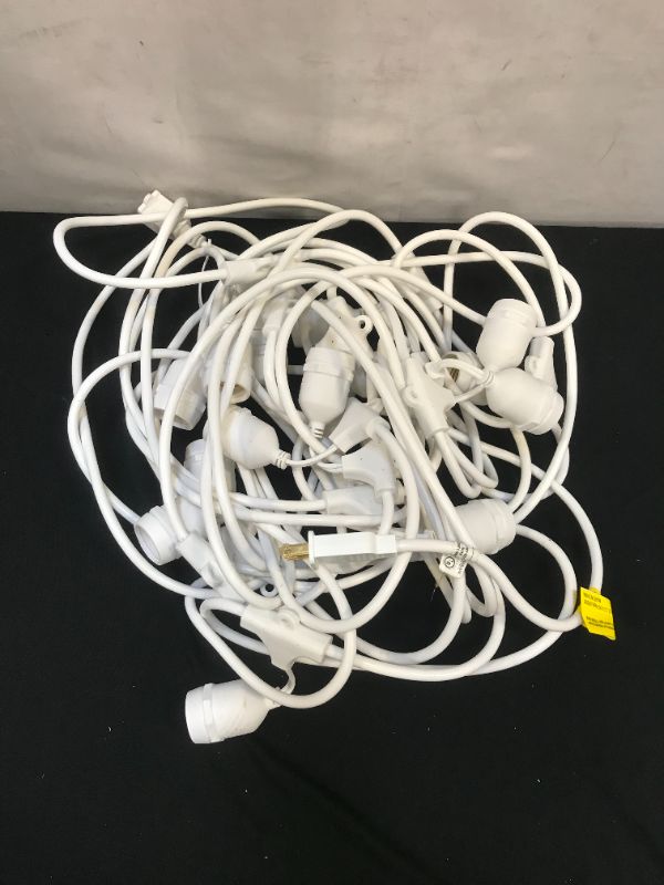 Photo 1 of Amazon Basics Outdoor Patio String Lights  S14 Bulb (Feet Unknown Approx.50 ) ( Bulb not include)model JCD-ST15
