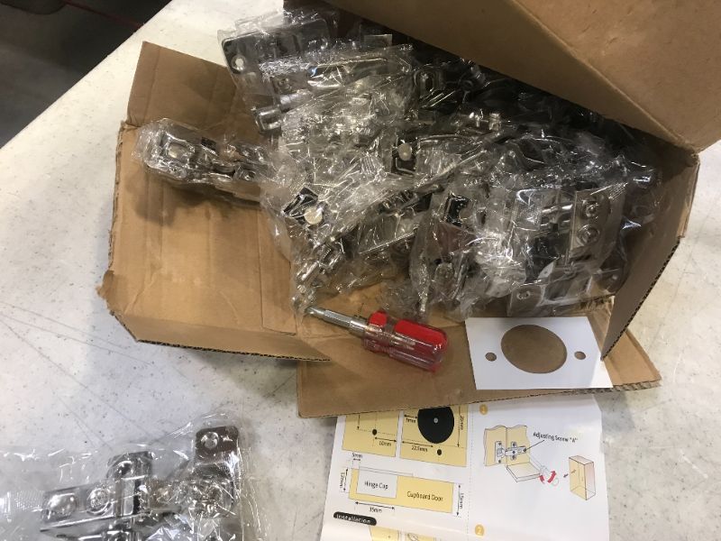 Photo 1 of cabinet hinges 22 count 