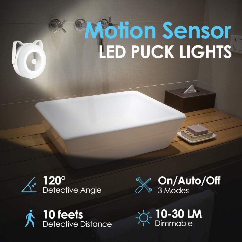 Photo 2 of Rechargeable Motion Sensor LED Puck Lights, Battery-Powered Under Cabinet Lighting, Magnetic Stick-on Lights, Wireless Closet Light, Under Counter Lights, 3-Pack
