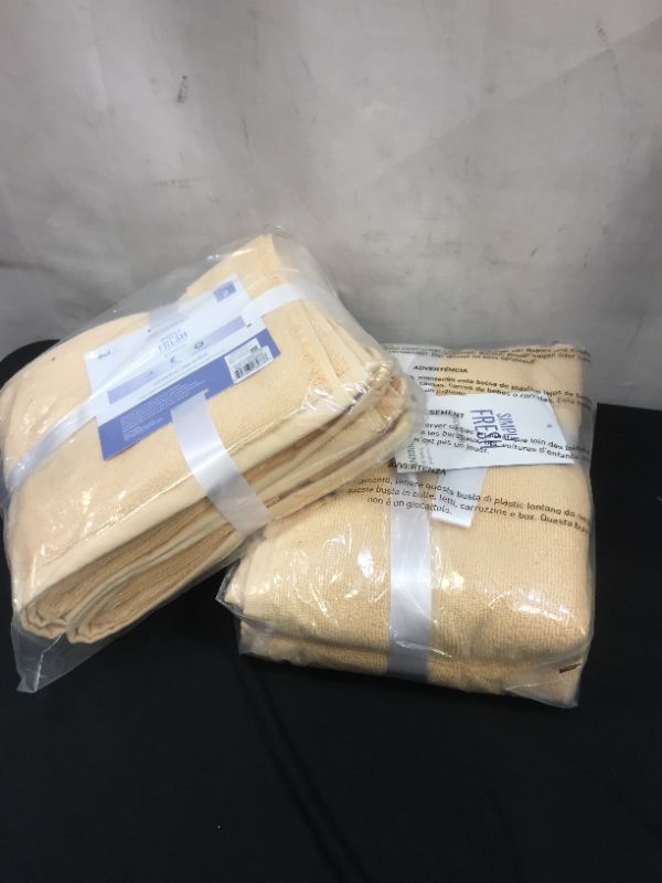 Photo 1 of 4 pcs of yellow bath towels 