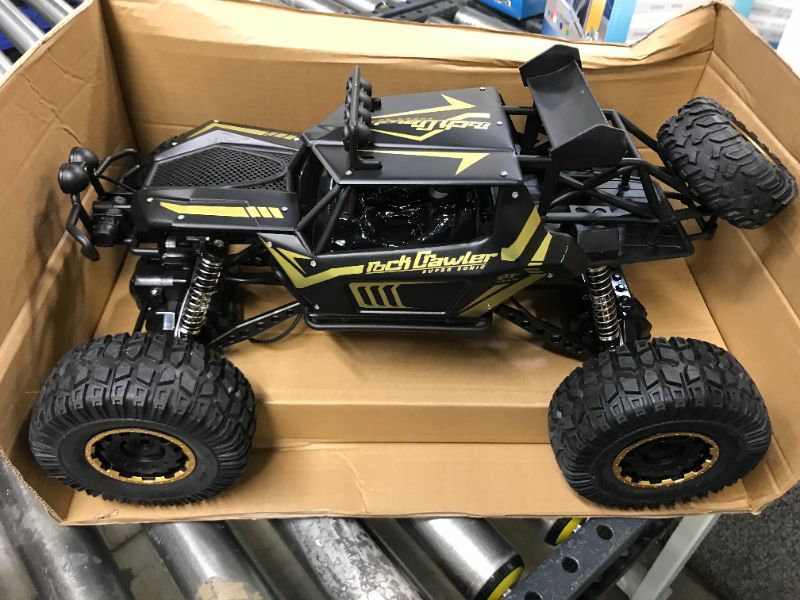 Photo 2 of Kids RC Car Toy, Remote Control Car 1:12 Big Scale 4WD Off Road Rock Crawlers 2.4Ghz Radio Remote Control Monster Trucks,High Speed Racing All Terrain Climbing Car Gift for Kids
