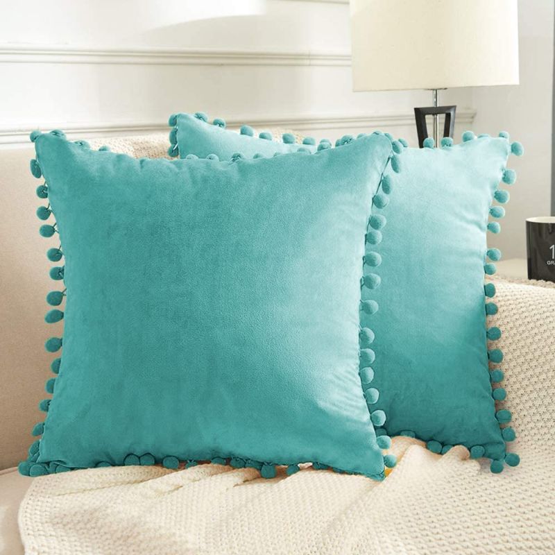 Photo 1 of BeBen Decorative Throw Pillow Covers with Pom Poms, Pack of 2 Soft Particles Velvet Pillow Cases Square Cushion Covers for Couch Bedroom Car Sofa Outdoors 18x18 Teal Green