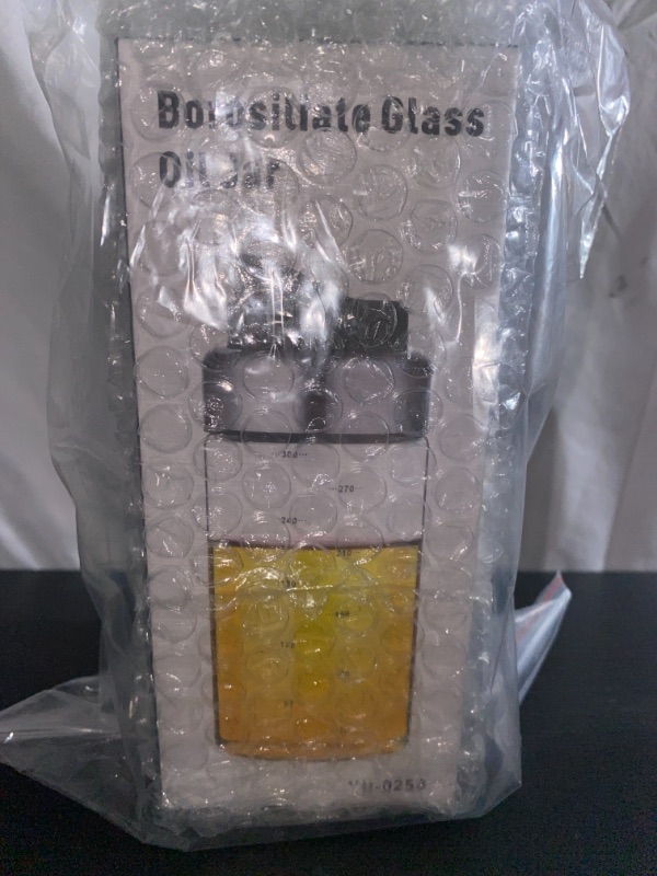 Photo 1 of borosilicate glass oil jar 10 oz