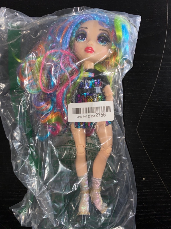 Photo 1 of Miscellaneous rainbow doll, sold as is