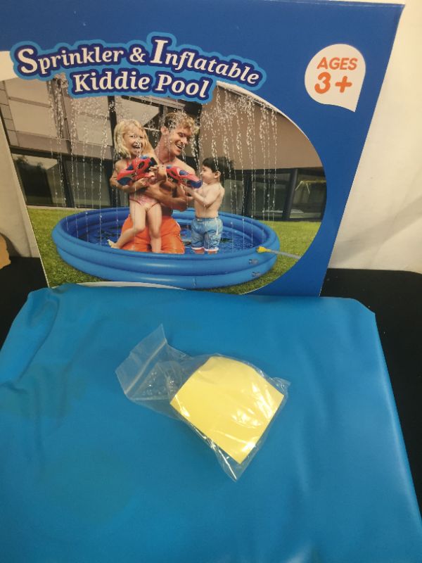 Photo 1 of kiddie pool with sprinkler 