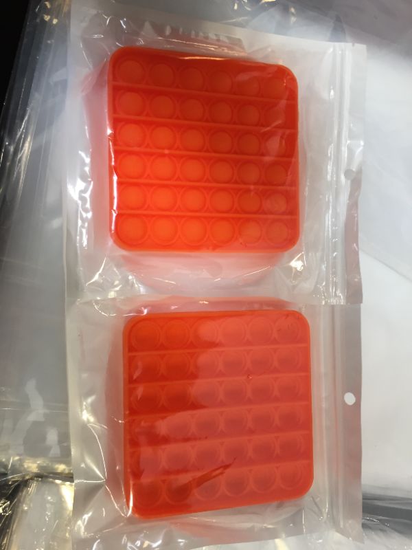 Photo 1 of Push and Pop Bubble Fidget Sensory Toy, a Loud Side and a Quiet Side to Pop, Autism ADHD Special Needs Stress Reliever Silicone Squeeze Toy, a Great Way to Relax and Keep Kids Adults Busy, Orange