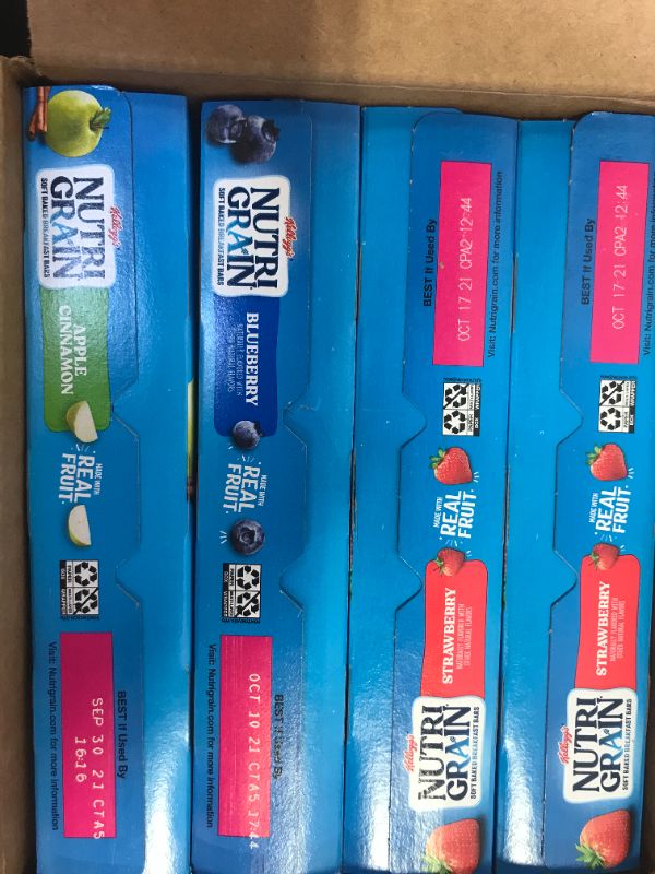 Photo 1 of 4boxes of  cereal bars 2 strawberry 1 apple 1blueberry best by 10*21*21