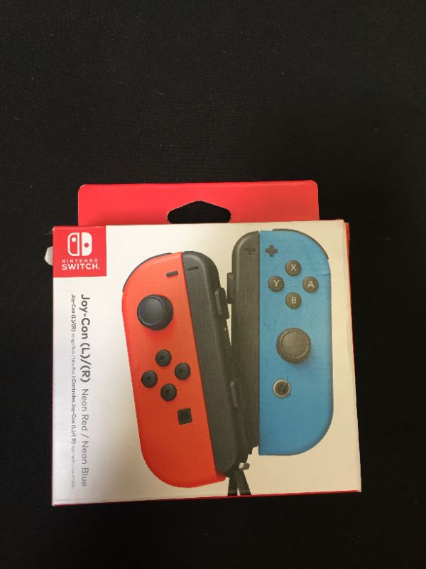 Photo 1 of Nintendo Joy-Con (L/R) - Neon Red/Neon Blue