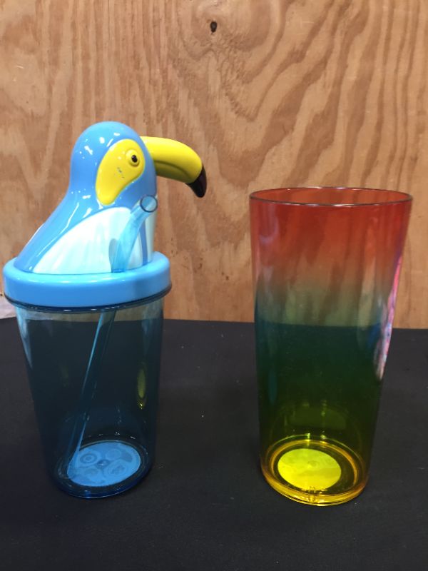 Photo 1 of 22oz Plastic Ombre cup
blue tucan lid cup with straw 