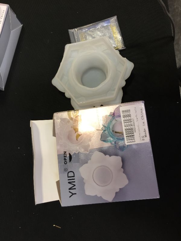 Photo 1 of 3 pack of silicone flower candle holders