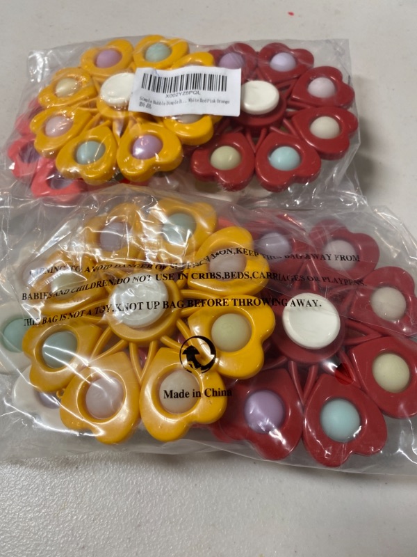 Photo 1 of Fidget toys 4 pack 2 packs 