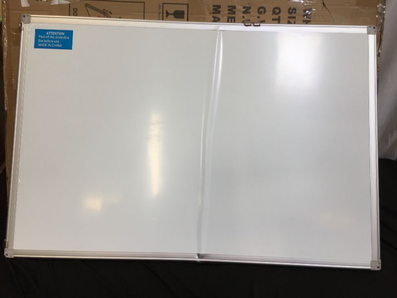 Photo 2 of Magnetic White Board (ITEM HAS CREASE DOWN THE MIDDLE)