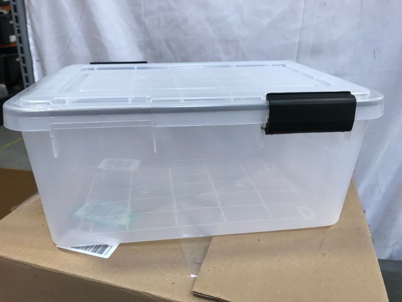 Photo 1 of a box of plastic storage containers with lids 4 count 