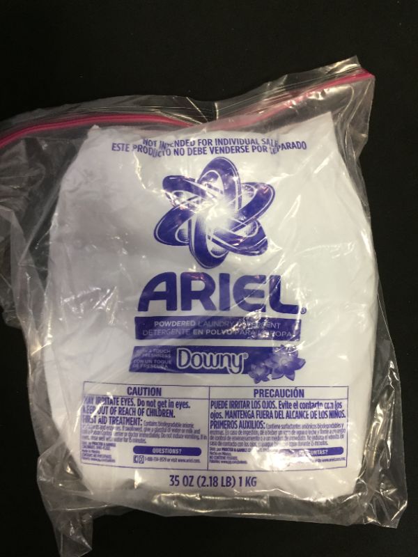 Photo 1 of areil powered detergent with downy 