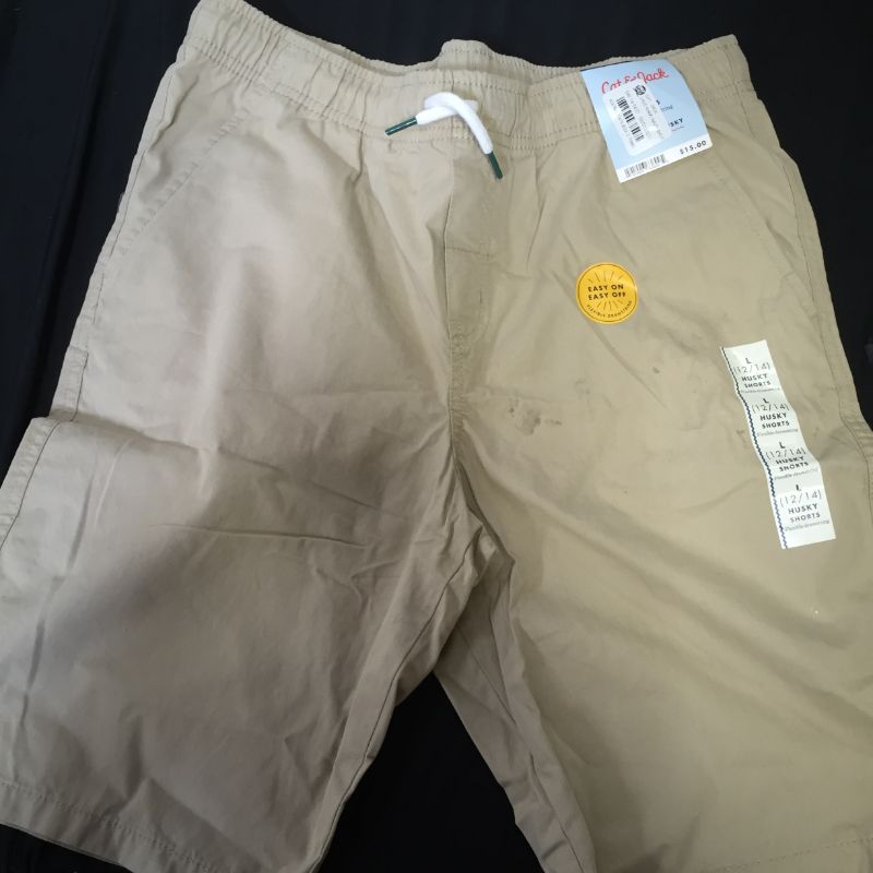 Photo 2 of 1 pair of boys Pull-On Woven Shorts - Cat & Jack™ size L - has damage on the front 