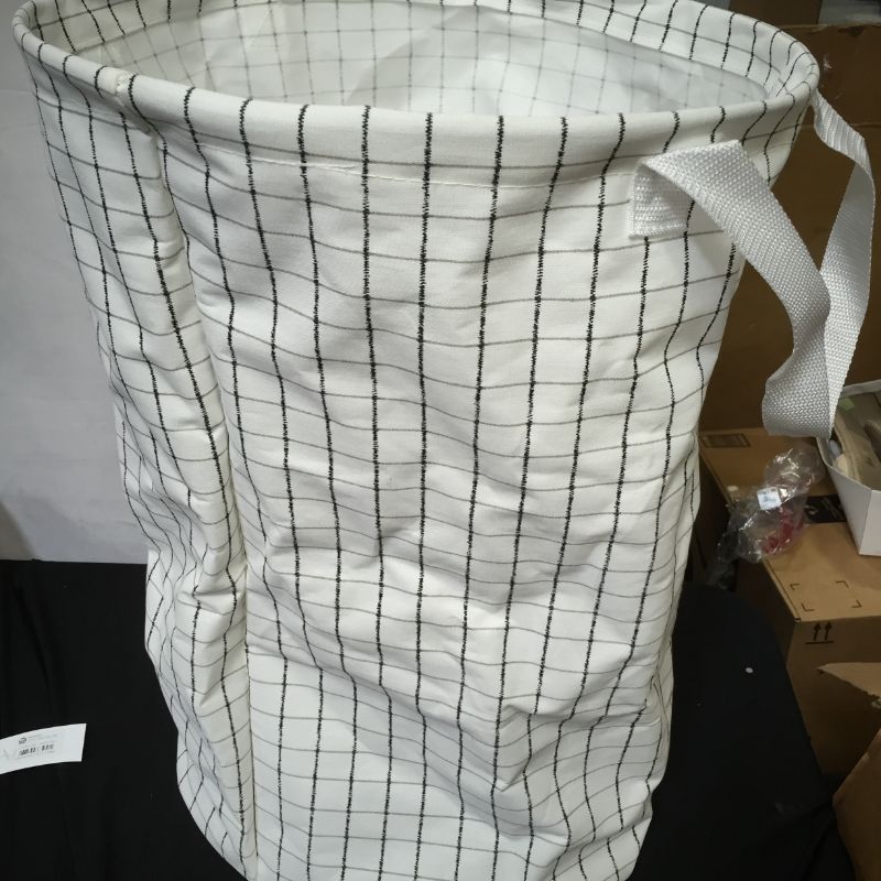 Photo 1 of black and white foldable laundry basket 
