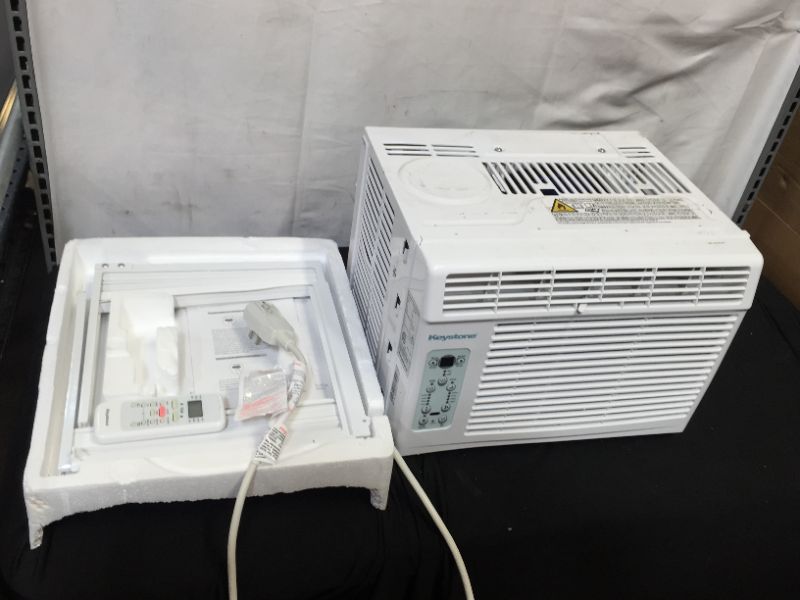 Photo 1 of 150 Sq. Ft. 5,000 BTU Window Air Conditioner with Follow Me LCD Remote Control
HEAVILOY USED -- MINOR DAMAGE