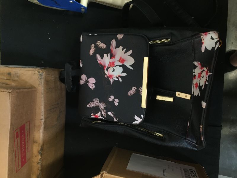 Photo 1 of womens back pack bag 