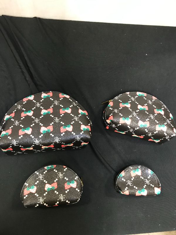 Photo 1 of 4 pcs small makeup bags 