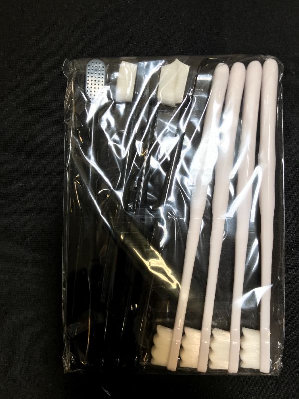 Photo 1 of 2 pack soft toothbrushes ( 4 black and 4 white in each pack ) 