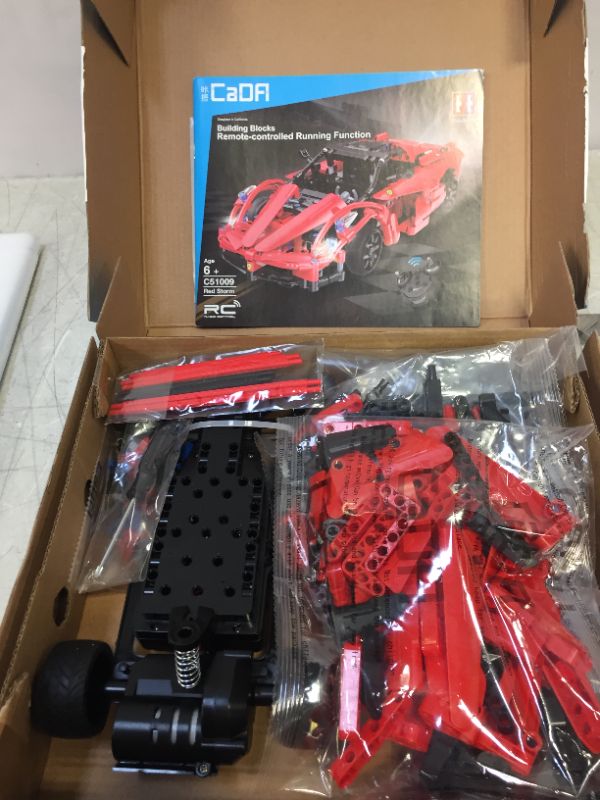 Photo 1 of CaDFI, Radio Controlled Car - Red
