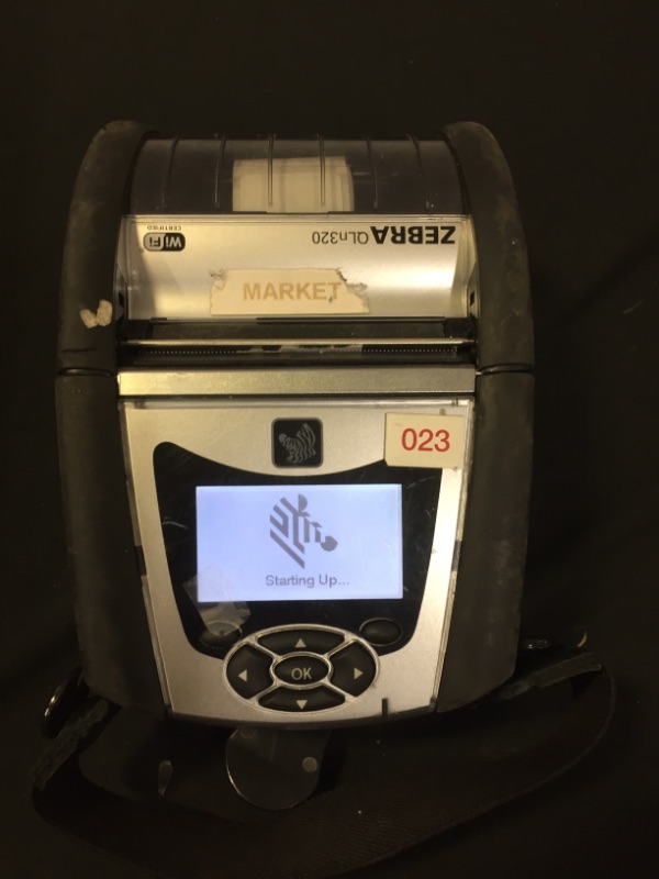 Photo 4 of Zebra QLN320 Mobile Printer With Printhead (MAJOR DAMAGES AND SCRATCHES TO ITEM, MISSING CHARGER AND OTHER PIECES)