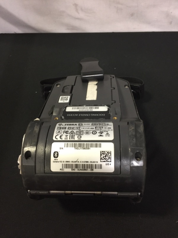 Photo 7 of Zebra QLN320 Mobile Printer With Printhead (MAJOR DAMAGES AND SCRATCHES TO ITEM, MISSING CHARGER AND OTHER PIECES)