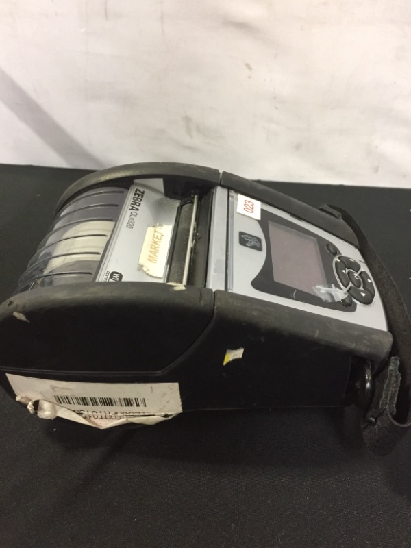 Photo 6 of Zebra QLN320 Mobile Printer With Printhead (MAJOR DAMAGES AND SCRATCHES TO ITEM, MISSING CHARGER AND OTHER PIECES)
