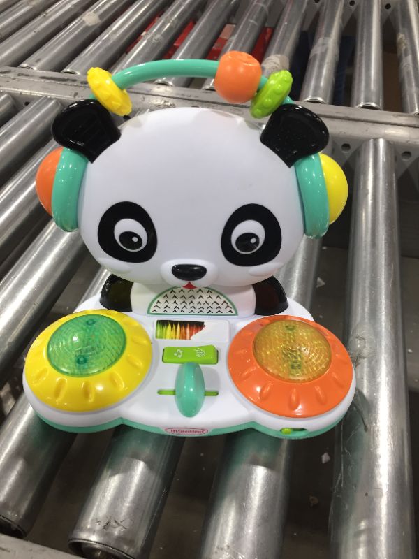 Photo 2 of Infantino Spin & Slide DJ Panda - Musical Toy with Busy Beads, Light-up Turntable Drums, Funky Beats, switches, Silly Songs and 2 Volume Settings, for Babies and Toddlers
