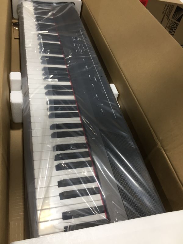 Photo 2 of Alesis Recital – 88 Key Digital Piano Keyboard with Semi Weighted Keys, 2x20W Speakers, 5 Voices, Split, Layer and Lesson Mode, FX and Piano Lessons