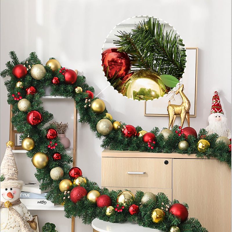 Photo 1 of BEKVAMT Christmas Garland with Lights, 9 Foot by 108 Inch Xmas Traditional Christmas Garland with Red Golden Ball Ornaments, Pre-Lit with 60 Warm Clear LED Lights with 4 Hooks