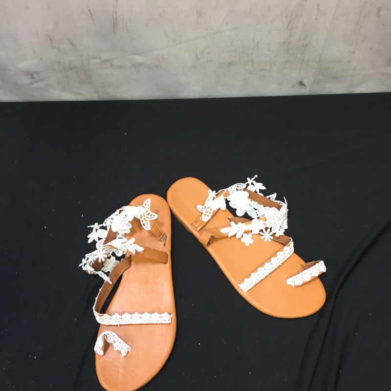 Photo 1 of Generic Tan and White Sandals. Size 7