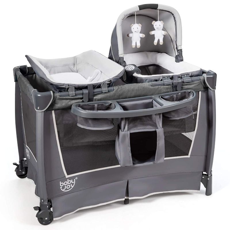 Photo 1 of BABY JOY 4 in 1 Nursery Center, Pack 'n Play with Bassinet, Changing Table, Foldable Infant Bassinet with Music, Large Capacity Storage Shelf, Oxford Carry Bag, Portable Baby Playard (Space Gray)
