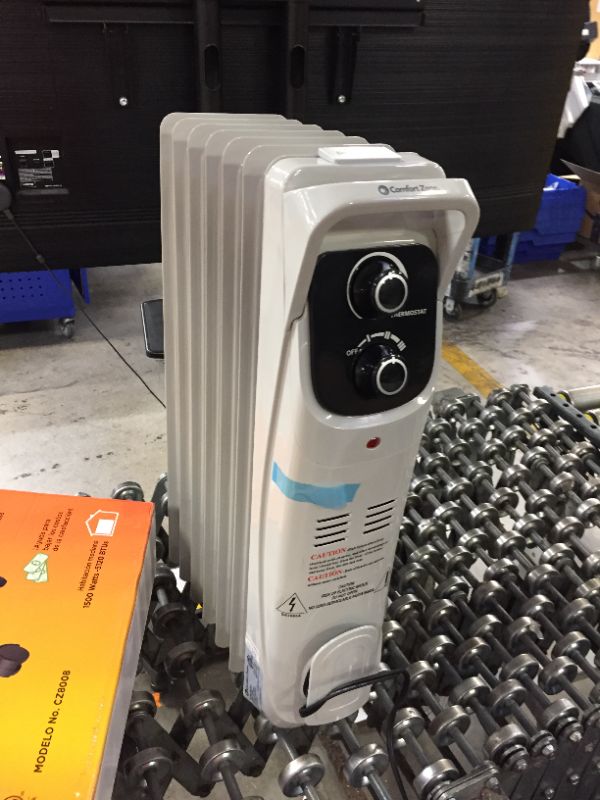 Photo 1 of 1,500-Watt White Electric Oil-Filled Radiator Space Heater with Silent Operation
