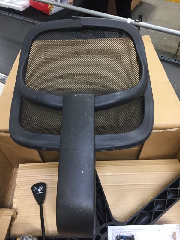 Photo 2 of Amazon Basics Low-Back, Upholstered Mesh, Adjustable, Swivel Computer Office Desk Chair, Black