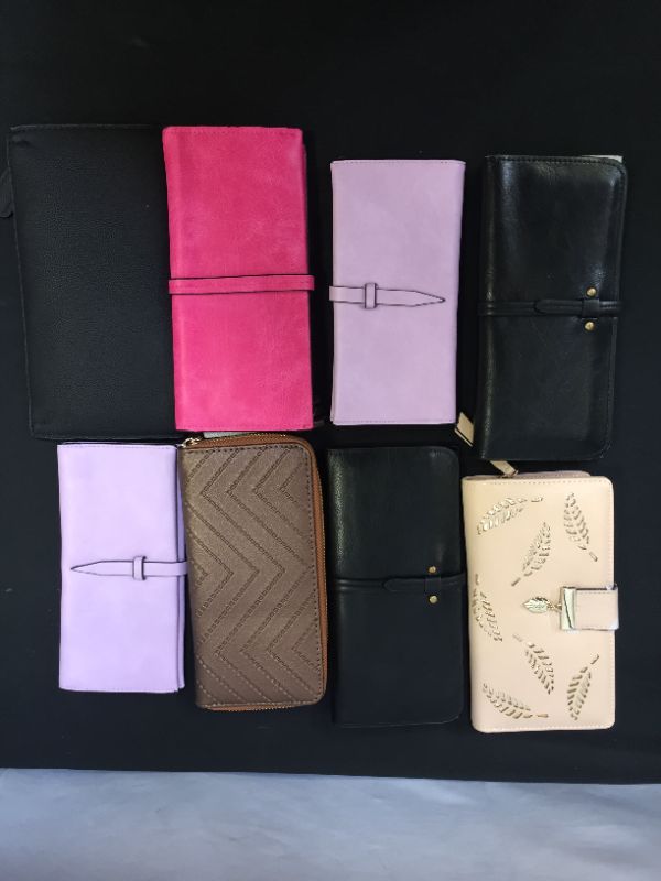 Photo 1 of assorted wallets 